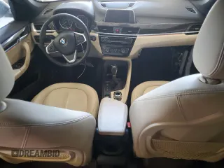 2017 BMW X1 xDrive28i z VIN WBXHT3C36H5F75824, wystawiony jako Copart lot #56330735 z przebiegiem 57 122 mil mil oraz Szkody całkowita. Historia ofert i sprzedaży dostępna na DreamBid. Obrazek 8.