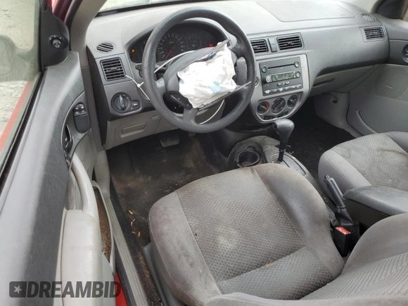 2007 Ford Focus S with VIN 1FAFP31N57W242751, listed as a Copart auction lot 54691345 with 137,224 mi miles and Salvage title. Bid and sale history available at DreamBid. Image 8.