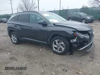 2022 Hyundai Tucson SEL z VIN 5NMJBCAE7NH141391, wystawiony jako IAAI lot #41949157 z przebiegiem 107 697 mil mil oraz . Historia ofert i sprzedaży dostępna na DreamBid. Obrazek 1.