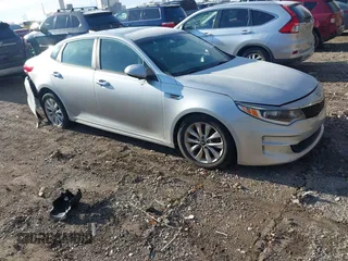 2016 Kia Optima LX with VIN 5XXGT4L35GG059931, listed as a IAAI auction lot 40995180 with 130,596 mi miles. Bid and sale history available at carsss.com. Image 1.