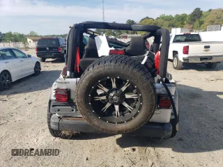 2003 Jeep Wrangler Rubicon z VIN 1J4FA69S53P375189, wystawiony jako Copart lot #54292035 z przebiegiem 55 863 mil mil oraz Szkoda całkowita • Salvage title. Historia ofert i sprzedaży dostępna na DreamBid. Obrazek 6.