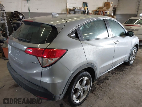 2021 Honda HR-V LX with VIN 3CZRU6H33MM746713, listed as a IAAI auction lot 41973303 with 56,476 mi miles. Bid and sale history available at carsss.com. Image 4.
