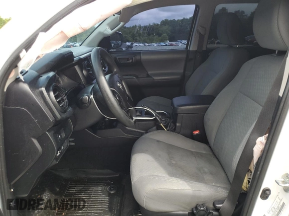 2021 Toyota Tacoma SR с VIN 3TMCZ5AN4MM386662, выставлен на аукционе Copart как лот 56954865 с пробегом 70 623 миль миль и Списание • Salvage title. История ставок и продаж доступна на DreamBid. Изображение 7.