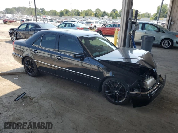 1996 Mercedes-Benz C with VIN WDBHA28E1TF402525, listed as a Copart auction lot 69050504 with 178,492 mi miles and Salvage Title. Bid and sale history available at carsss.com. Image 4.