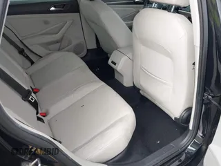 2019 Volkswagen Jetta SEL z VIN 3VWEB7BU2KM273950, wystawiony jako IAAI lot #42414034 z przebiegiem 84 100 mil mil oraz . Historia ofert i sprzedaży dostępna na DreamBid. Obrazek 8.