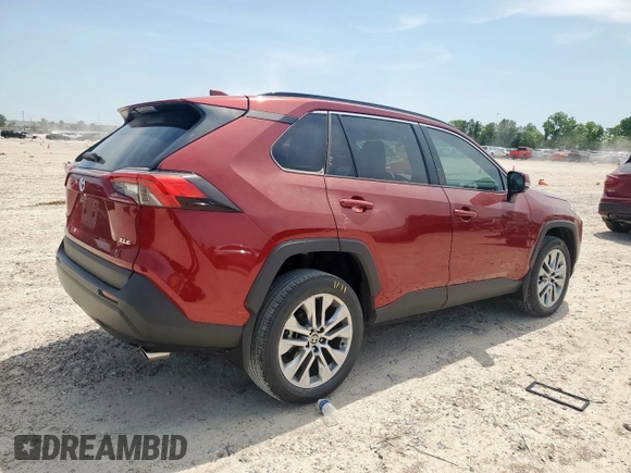 2022 Toyota RAV4 XLE Premium with VIN 2T3C1RFV7NW234284, listed as a Copart auction lot 57142325 with 21,580 mi miles and Salvage title. Bid and sale history available at DreamBid. Image 3.