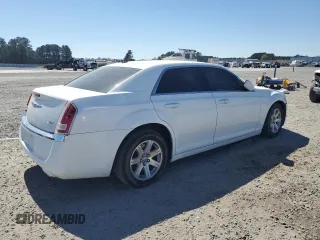 2013 Chrysler 300 with VIN 2C3CCAAG5DH509660, listed as a Copart auction lot 50323635 with 184,157 mi miles and Salvage Title. Bid and sale history available at carsss.com. Image 3.