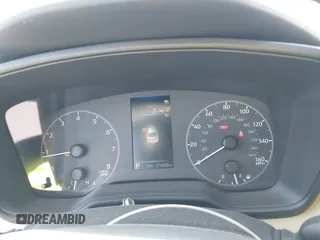 2023 Toyota Corolla LE z VIN 5YFB4MDE9PP004980, wystawiony jako IAAI lot #41788099 z przebiegiem 21 650 mil mil oraz . Historia ofert i sprzedaży dostępna na DreamBid. Obrazek 7.