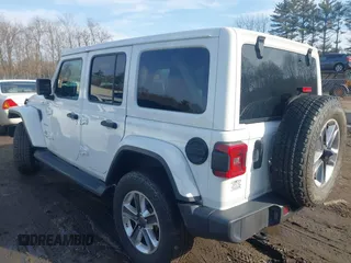 2021 Jeep Wrangler Unlimited Sahara with VIN 1C4HJXEG9MW532302, listed as a IAAI auction lot 41646755 with 32,893 mi miles and . Bid and sale history available at DreamBid. Image 3.