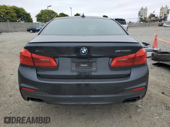 2019 BMW 5 Series M550i xDrive with VIN WBAJB9C53KB464298, listed as a Copart auction lot 59892105 with Not provided miles and Salvage title. Bid and sale history available at DreamBid. Image 6.