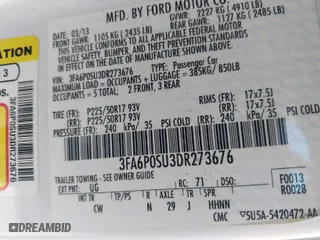 2013 Ford Fusion Energi Titanium with VIN 3FA6P0SU3DR273676, listed as a IAAI auction lot 41777822 with 189,283 mi miles. Bid and sale history available at carsss.com. Image 9.
