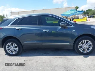 2020 Cadillac XT5 Luxury FWD z VIN 1GYKNAR45LZ224459, wystawiony jako IAAI lot #42295055 z przebiegiem 69 751 mil mil oraz . Historia ofert i sprzedaży dostępna na DreamBid. Obrazek 13.