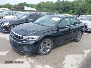 2024 Volkswagen Jetta SE with VIN 3VW7M7BU0RM059133, listed as a IAAI auction lot 42553729 with 13,091 mi miles and . Bid and sale history available at DreamBid. Image 14.