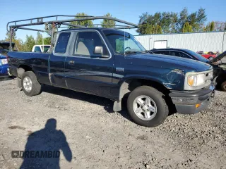 1997 Mazda B-Series 2WD Truck LE with VIN 4F4CR16X3VTM12603, listed as a Copart auction lot 74965704 with 145,098 mi miles and Salvage Title. Bid and sale history available at carsss.com. Image 4.