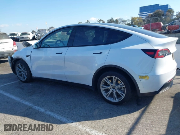 2022 Tesla Model Y Long Range z VIN 7SAYGDEE8NF374636, wystawiony jako IAAI lot #41545669 z przebiegiem 41 965 mil mil oraz . Historia ofert i sprzedaży dostępna na DreamBid. Obrazek 14.