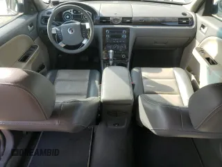 2008 Mercury Sable with VIN 1MEHM40W38G621379, listed as a Copart auction lot 54855085 with 107,443 mi miles and Salvage title. Bid and sale history available at DreamBid. Image 8.