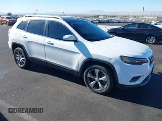 2020 Jeep Cherokee Limited with VIN 1C4PJLDBXLD536346, listed as a IAAI auction lot 41164017 with 35,057 mi miles. Bid and sale history available at carsss.com. Image 1.
