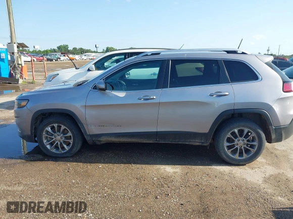 2019 Jeep Cherokee Latitude Plus with VIN 1C4PJLLB5KD403431, listed as a IAAI auction lot 42127918 with 94,360 mi miles and . Bid and sale history available at DreamBid. Image 13.