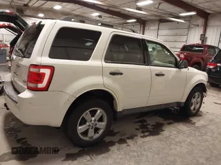 2012 Ford Escape XLT z VIN 1FMCU9DG4CKA72675, wystawiony jako IAAI lot #41212739 z przebiegiem 112 781 mil mil oraz . Historia ofert i sprzedaży dostępna na DreamBid. Obrazek 14.