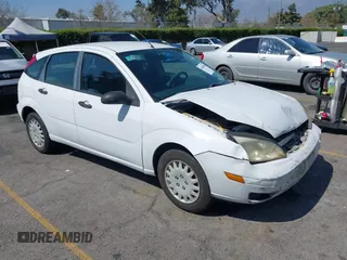 2005 Ford Focus S z VIN 3FAFP37N25R142856, wystawiony jako IAAI lot #40429836 z przebiegiem 216 872 mil mil oraz . Historia ofert i sprzedaży dostępna na DreamBid. Obrazek 1.