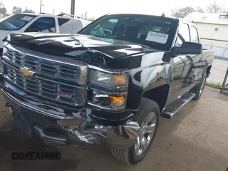 2014 Chevrolet Silverado 1500 LT with VIN 1GCVKREC5EZ325771, listed as a IAAI auction lot 41691858 with 123,475 mi miles and . Bid and sale history available at DreamBid. Image 2.