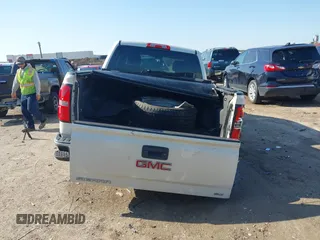 2014 GMC Sierra 1500 SLT with VIN 3GTP1VEC5EG486951, listed as a IAAI auction lot 41939376 with 131,857 mi miles and . Bid and sale history available at DreamBid. Image 16.