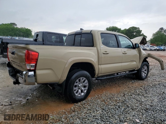 2017 Toyota Tacoma SR5 with VIN 5TFAZ5CN2HX030781, listed as a Copart auction lot 53957535 with 105,606 mi miles and Salvage Title. Bid and sale history available at DreamBid. Image 3.