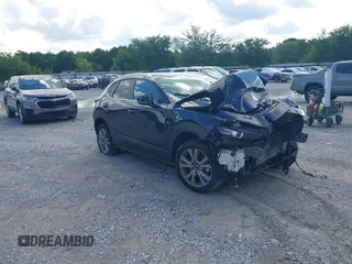 2022 Mazda CX-30 S Select with VIN 3MVDMBBL6NM448268, listed as a IAAI auction lot 42242290 with Not provided miles and . Bid and sale history available at DreamBid. Image 1.