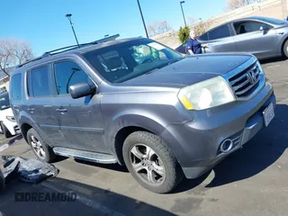 2014 Honda Pilot EX-L with VIN 5FNYF3H52EB015806, listed as a IAAI auction lot 41676586 with 193,215 mi miles and . Bid and sale history available at carsss.com. Image 14.