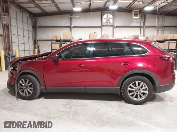 2019 Mazda CX-9 Touring with VIN JM3TCACY1K0331904, listed as a IAAI auction lot 42146945 with 77,699 mi miles and . Bid and sale history available at DreamBid. Image 14.