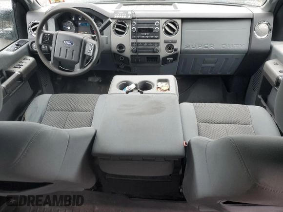2014 Ford F-250 XL with VIN 1FT7W2B60EEA33908, listed as a Copart auction lot 54752765 with 215,428 mi miles and Salvage title. Bid and sale history available at DreamBid. Image 8.