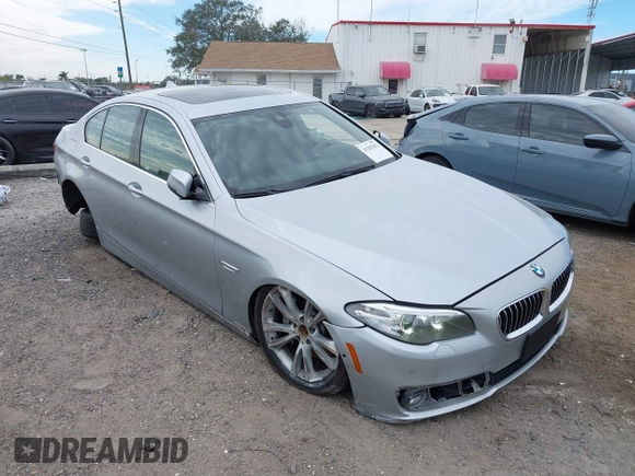 2015 BMW 5 Series 535i xDrive with VIN WBA5B3C54FD544802, listed as a IAAI auction lot 41283822 with 93,828 mi miles. Bid and sale history available at carsss.com. Image 1.