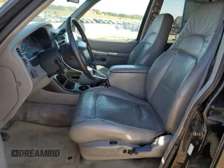 1997 Mercury Mountaineer z VIN 4M2DU52P5VUJ58731, wystawiony jako Copart lot #69710404 z przebiegiem 266 522 mil mil oraz Tytuł czysty. Historia ofert i sprzedaży dostępna na DreamBid. Obrazek 7.