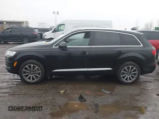 2019 Audi Q7 Premium with VIN WA1AHAF74KD029904, listed as a IAAI auction lot 41024012 with 79,896 mi miles and . Bid and sale history available at DreamBid. Image 14.