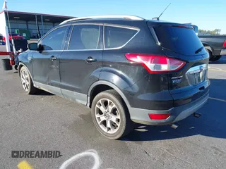 2016 Ford Escape Titanium with VIN 1FMCU0JX3GUA90420, listed as a IAAI auction lot 41850537 with 115,770 mi miles. Bid and sale history available at carsss.com. Image 3.