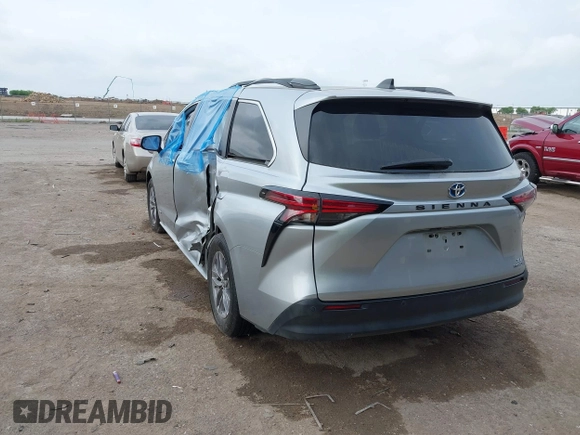 2021 Toyota Sienna XLE with VIN 5TDYRKEC9MS041334, listed as a IAAI auction lot 42145698 with 117,229 mi miles and . Bid and sale history available at DreamBid. Image 3.