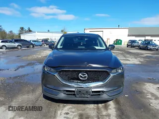 2017 Mazda CX-5 Touring with VIN JM3KFBCL3H0214881, listed as a IAAI auction lot 41694560 with 64,609 mi miles. Bid and sale history available at carsss.com. Image 12.