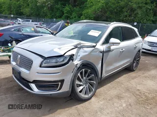 2019 Lincoln Nautilus Reserve with VIN 2LMPJ8LP5KBL32374, listed as a IAAI auction lot 42219316 with 48,276 mi miles and . Bid and sale history available at DreamBid. Image 2.