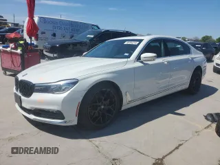 2018 BMW 7 Series 740i xDrive with VIN WBA7E4C52JGV24125, listed as a Copart auction lot 48164214 with 77,695 mi miles. Bid and sale history available at carsss.com. Image 1.
