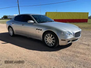 2006 Maserati Quattroporte z VIN ZAMCE39A660021029, wystawiony jako Copart lot #77386904 z przebiegiem 57 763 mil mil oraz Tytuł czysty. Historia ofert i sprzedaży dostępna na DreamBid. Obrazek 1.