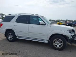 2004 Toyota Sequoia Limited with VIN 5TDZT38A04S236082, listed as a IAAI auction lot 41598592 with 104,042 mi miles. Bid and sale history available at carsss.com. Image 14.