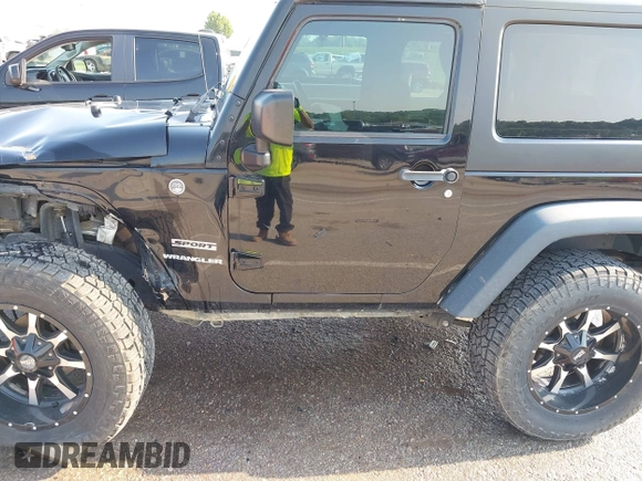 2017 Jeep Wrangler Sport with VIN 1C4AJWAG6HL654592, listed as a IAAI auction lot 42447379 with 61,585 mi miles and . Bid and sale history available at DreamBid. Image 17.