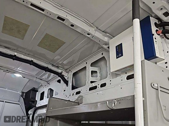 2023 Ford Transit Cargo с VIN 1FTBR2X82PKA60186, выставлен на аукционе IAAI как лот 42573161 с пробегом 47 202 миль миль и . История ставок и продаж доступна на DreamBid. Изображение 3.