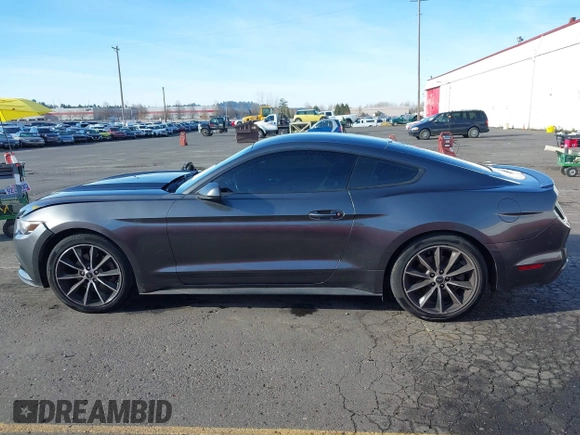 2015 Ford Mustang EcoBoost z VIN 1FA6P8TH7F5351477, wystawiony jako IAAI lot #41378347 z przebiegiem 104 755 mil mil oraz . Historia ofert i sprzedaży dostępna na DreamBid. Obrazek 14.