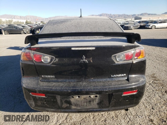 2016 Mitsubishi Lancer ES with VIN JA32U2FU1GU010590, listed as a Copart auction lot 77040544 with 27,616 mi miles and Salvage Title. Bid and sale history available at DreamBid. Image 6.