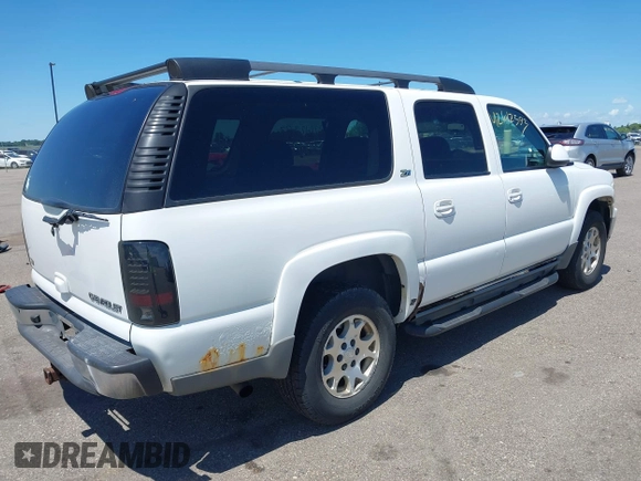 2003 Chevrolet Suburban LT z VIN 3GNFK16Z33G308805, wystawiony jako IAAI lot #42612393 z przebiegiem 205 213 mil mil oraz . Historia ofert i sprzedaży dostępna na DreamBid. Obrazek 4.