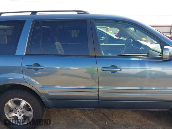 2007 Honda Pilot EX-L with VIN 5FNYF18517B028036, listed as a IAAI auction lot 41860675 with 61,217 mi miles and . Bid and sale history available at DreamBid. Image 14.