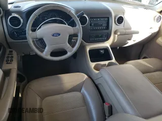 2004 Ford Expedition Eddie Bauer with VIN 1FMPU17L24LB89940, listed as a Copart auction lot 74082804 with 183,595 mi miles and Salvage Title. Bid and sale history available at carsss.com. Image 8.
