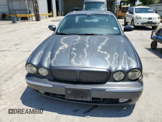 2004 Jaguar XJ with VIN SAJWA73B64TG18784, listed as a Copart auction lot 81254734 with 0 mi miles and Clean Title. Bid and sale history available at carsss.com. Image 5.
