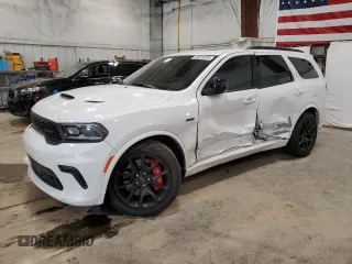 2023 Dodge Durango SRT 392 Premium z VIN 1C4SDJGJ9PC627774, wystawiony jako Copart lot #58220285 z przebiegiem Nie podano mil oraz Szkoda całkowita • Salvage title. Historia ofert i sprzedaży dostępna na DreamBid. Obrazek 1.